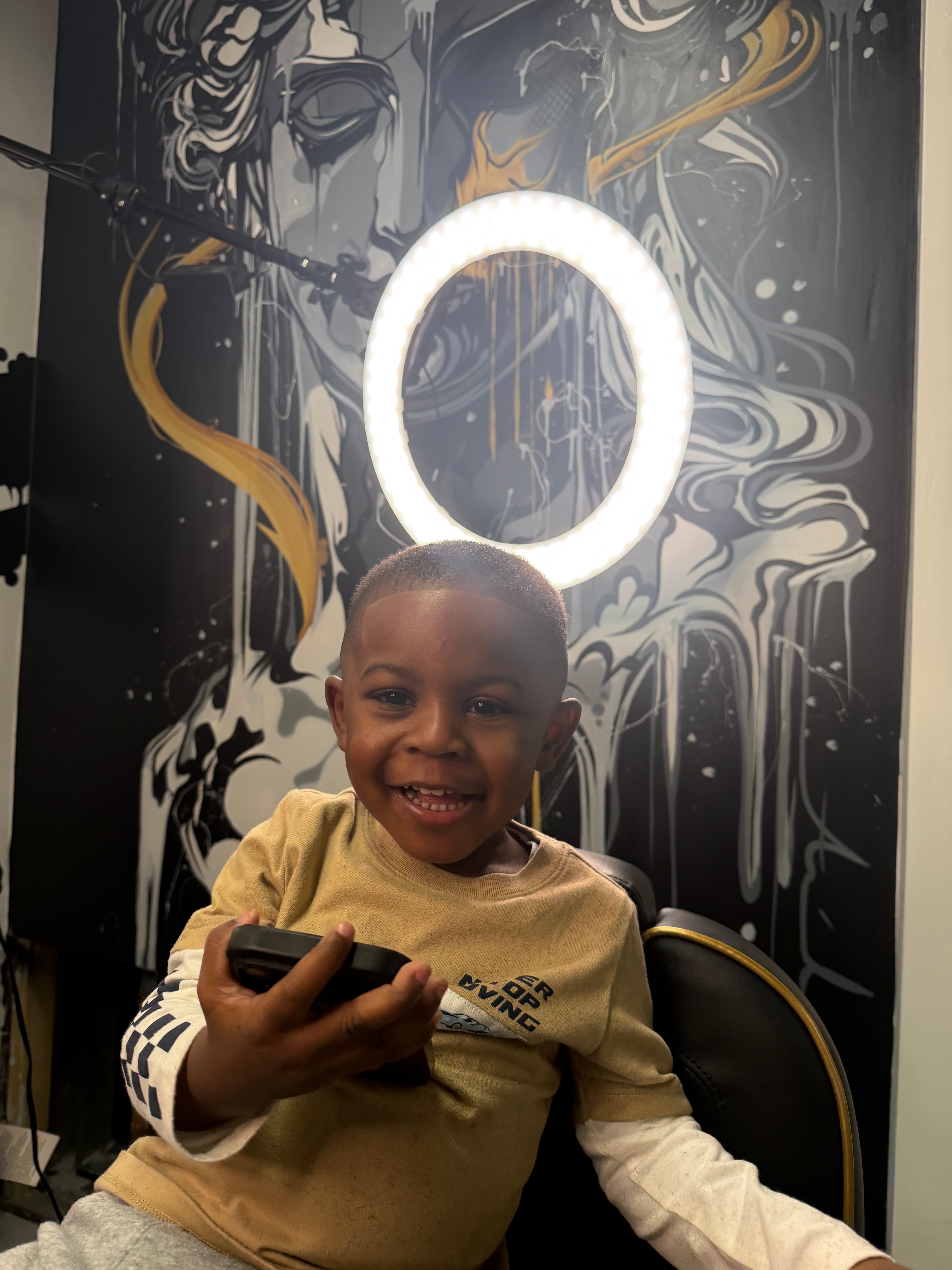 Kids haircut finished at Aces Barbershop